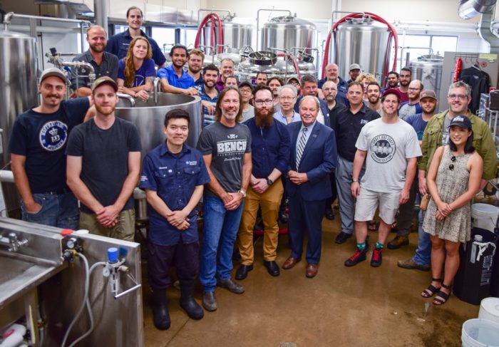 Bench Brewing Company president Matt Giffen (front, fourth from left), the first recipient of the Bench Brewing Graduating Student Award, Matthew Shea (front, fifth from left), and NC president Dan Patterson (front, third from right), are joined by students and faculty from the Brewmaster and Brewery Operations Management program and the team from Bench Brewing Company to celebrate a $30,000 gift from Bench Brewing.