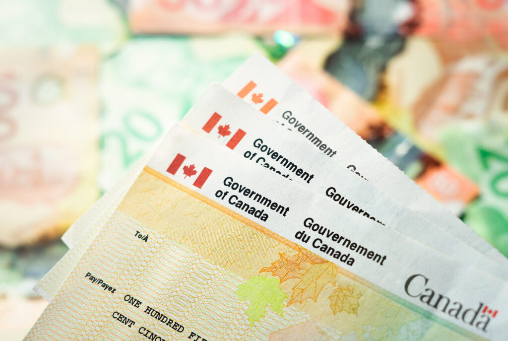 A row of official cheques from the Government of Canada