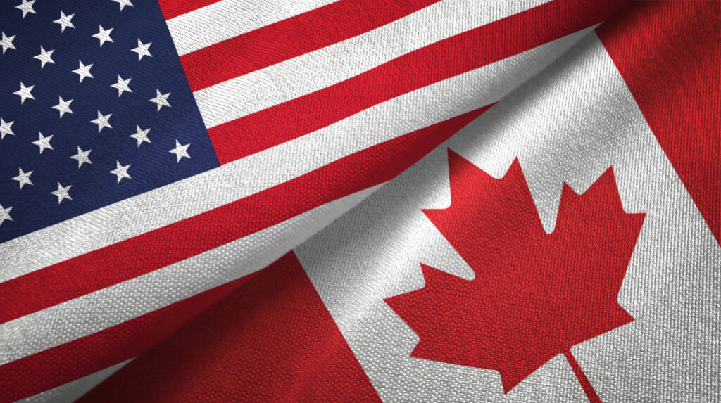 The Canadian and U.S. flags