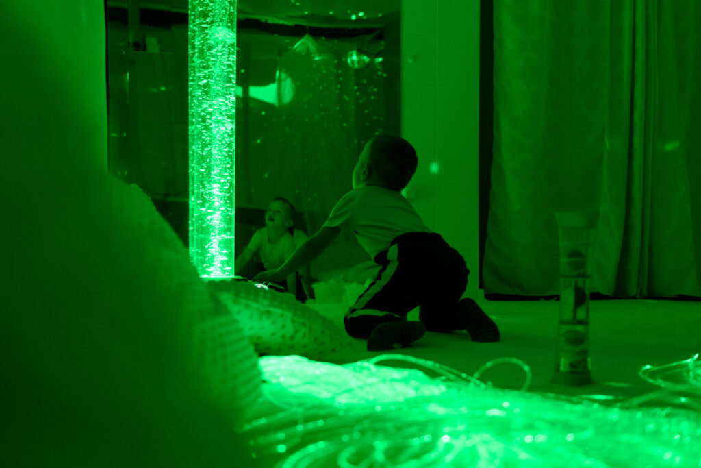 A child plays in a sensory room