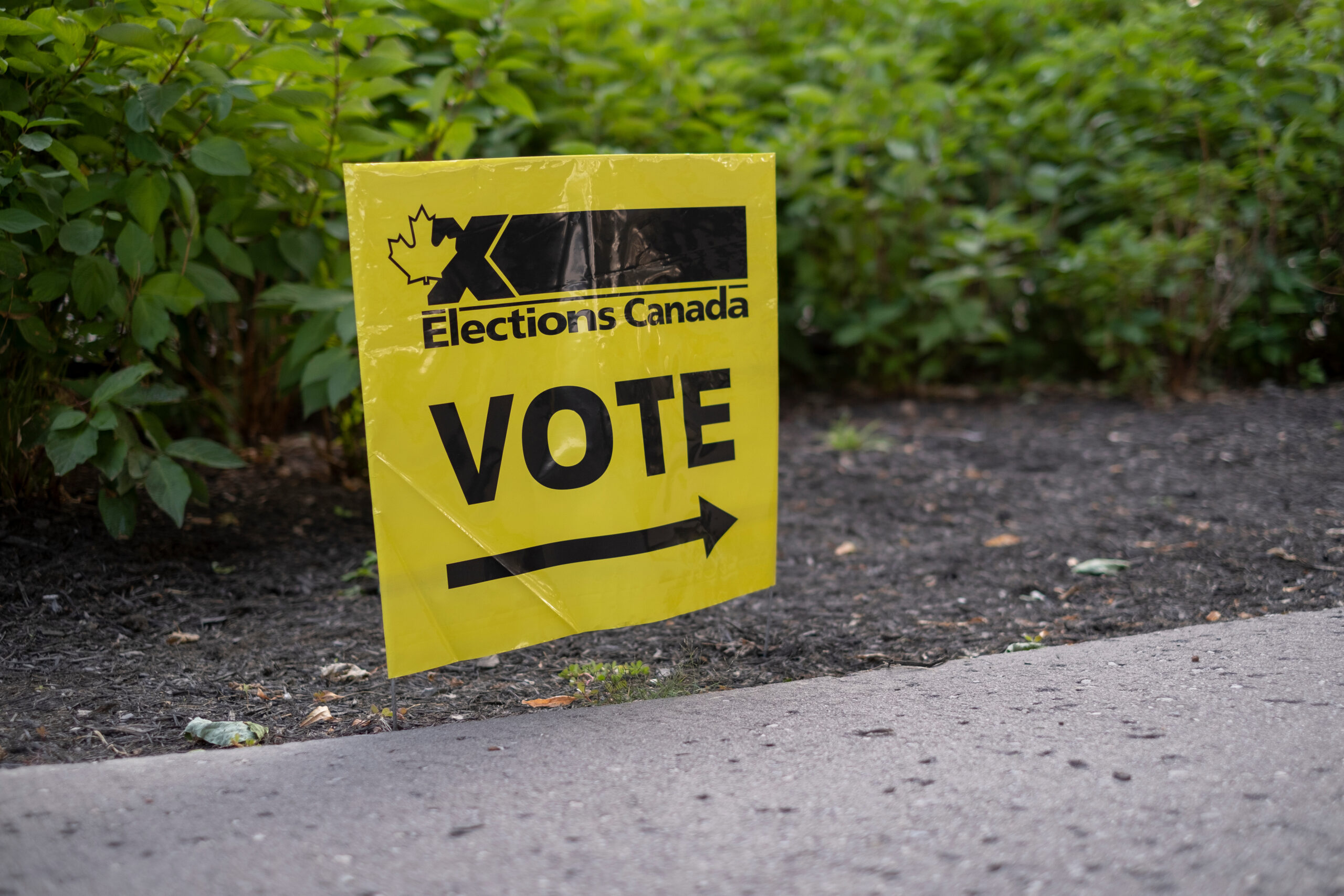 A "Vote" sign from Elections Canada outside a polling station