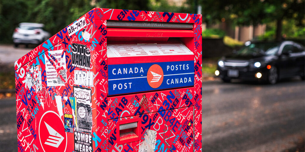 Vancouver, British Columbia, Canada – September 27, 2024: A Canada post office box on a neighborhood street corner in Vancouver, BC, Canada.